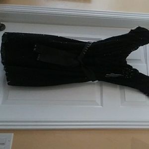 Adorable black sequin party dress.